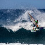 Graham Ezzy kicking at Ho'okipa